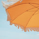 Orange vintage parasol with fringes ø170 x 210 cm.