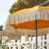 Orange vintage parasol with fringes ø170 x 210 cm.